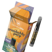 Cannabis Life Grandaddy Purp THCP vape cartridge beside its colorful box labeled Indica and 1 gram on a white background.