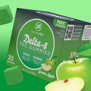 Cannabis Life Green Apple Delta-8 THC gummies box with whole and sliced green apples and green gummies on a green background.