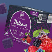 Cannabis Life Kushberry Delta-8 THC gummies box with mixed berries, cherries, and purple gummies on a blue-purple background.