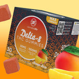Cannabis Life Mango Haze Delta-8 THC gummies box with mango slices and orange gummies on a yellow-orange background.