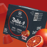 Cannabis Life Orange Crush Delta-9 THC gummies box with orange gummies and sliced oranges on an orange-red background.