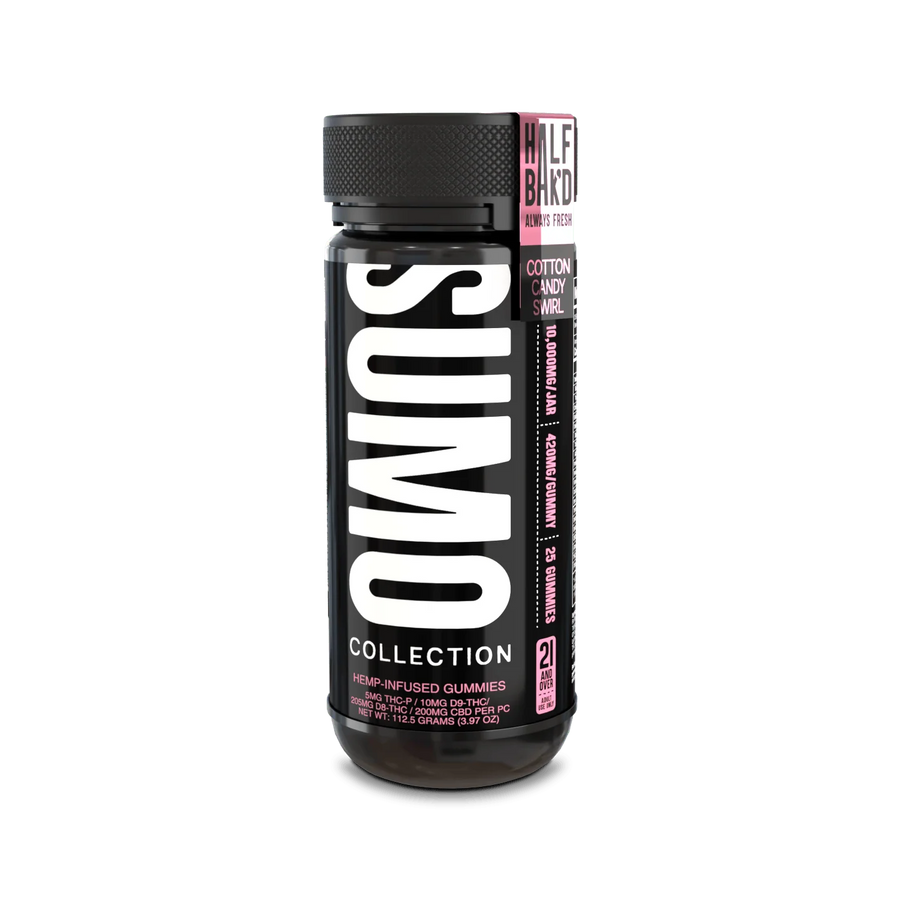 Alt Text: Half Bak’d Cotton Candy Swirl Sumo Gummies jar from the Sumo Collection, featuring a black container with vertical white "SUMO" branding and pink flavor label.