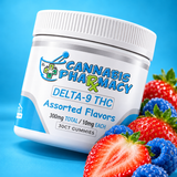 Cannabis Pharmacy assorted Delta-9 gummies, 10mg, 30-count jar with strawberries and blue raspberries on blue.