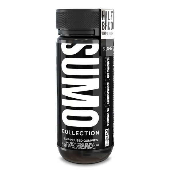 Tall black jar of Half Bak’d Slushie Sumo Gummies with vertical “SUMO” branding and a silver-accented label that reads 10,000mg per jar, 25ct. The white-on-black label features cannabinoid info like 25mg THCP and 10mg D9 per gummy.