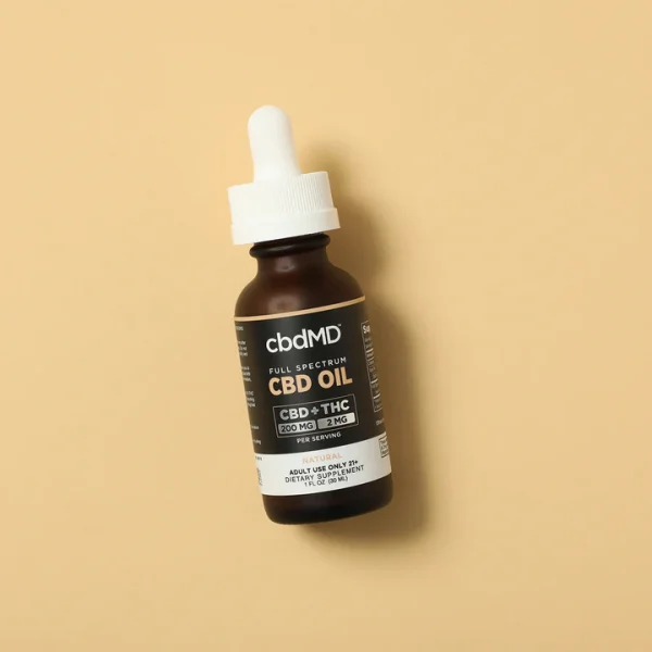 CBD Tincture - Full Spectrum 6000mg Brown Bottle set on a yellow background