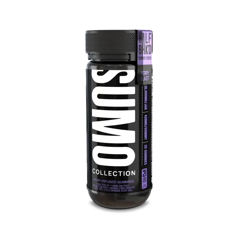 Alt Text: Front-facing image of Half Bak’d Berry Blast Sumo Gummies in a tall black jar with bold white branding and purple flavor label.