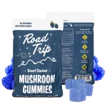 Road Trip Blue Raspberry Mushroom Gummies – front and back of packaging with dosing guide and blue gummy cubes shown.