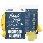 Road Trip Pineapple Mushroom Gummies – front and back of pouch shown with yellow gummies and pineapple slices.