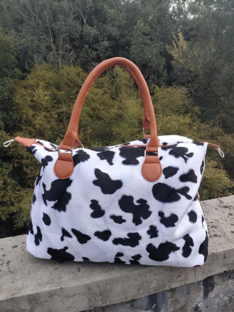 Bold cow and leopard-inspired print