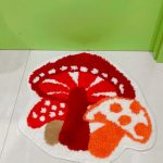 Cactus and mushroom shaped decorative area rug with colorful plant-inspired design for home décor.