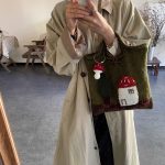Mushroom House Handmade Wool Handbag featuring a cute vintage mushroom house design and woven craftsmanship.