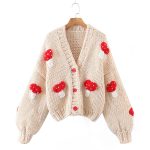 Autumn two-color mushroom sweater coat featuring a cute mushroom pattern and cozy knit design.