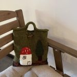 Mushroom House Handmade Wool Handbag featuring a cute vintage mushroom house design and woven craftsmanship.