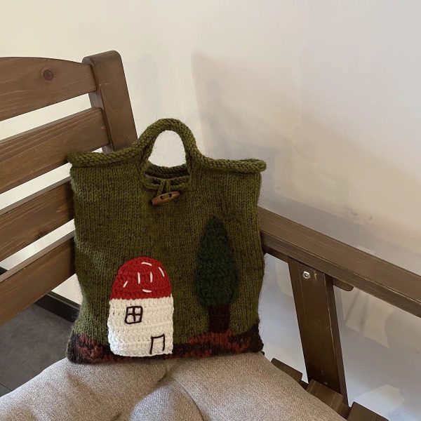 Mushroom House Handmade Wool Handbag featuring a cute vintage mushroom house design and woven craftsmanship.