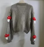 Women's 3D Mushroom Crochet Cardigan featuring tridimensional mushroom details and a loose knit design.