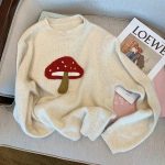 Women's Mushroom Thermal Sweater featuring a mushroom-inspired design and cozy knit fabric.