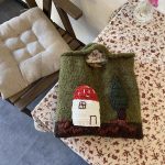 Mushroom House Handmade Wool Handbag featuring a cute vintage mushroom house design and woven craftsmanship.