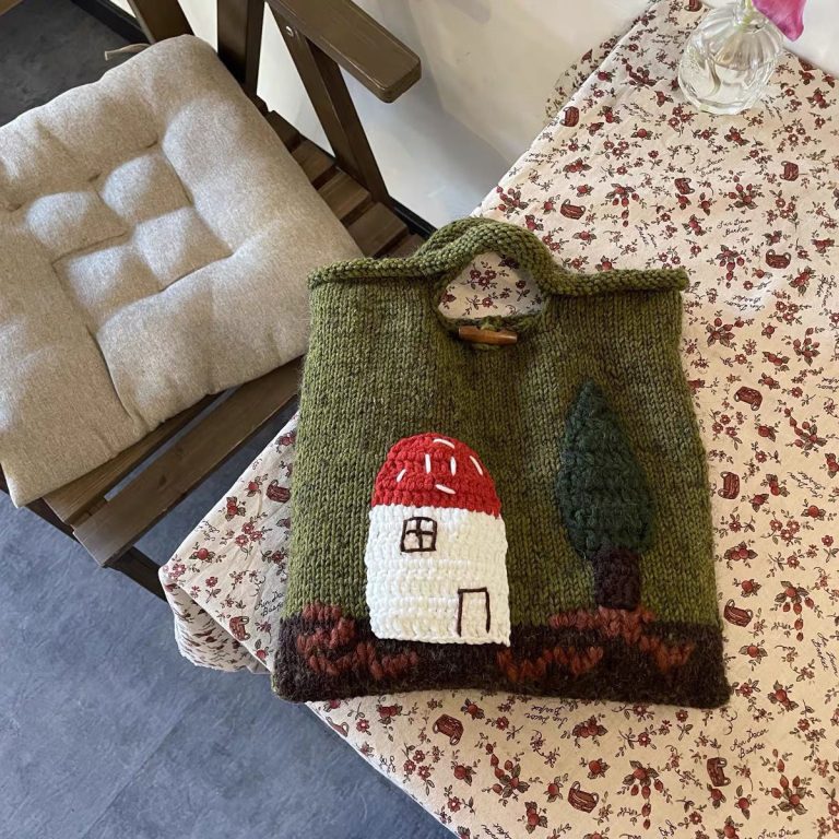 Mushroom House Handmade Wool Handbag featuring a cute vintage mushroom house design and woven craftsmanship.