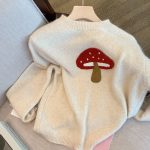 Women's Mushroom Thermal Sweater featuring a mushroom-inspired design and cozy knit fabric.