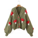 Autumn two-color mushroom sweater coat featuring a cute mushroom pattern and cozy knit design.